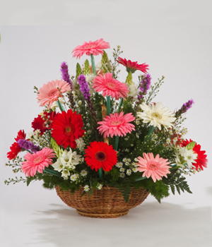 arreglo floral de gerberas en canasta caracas